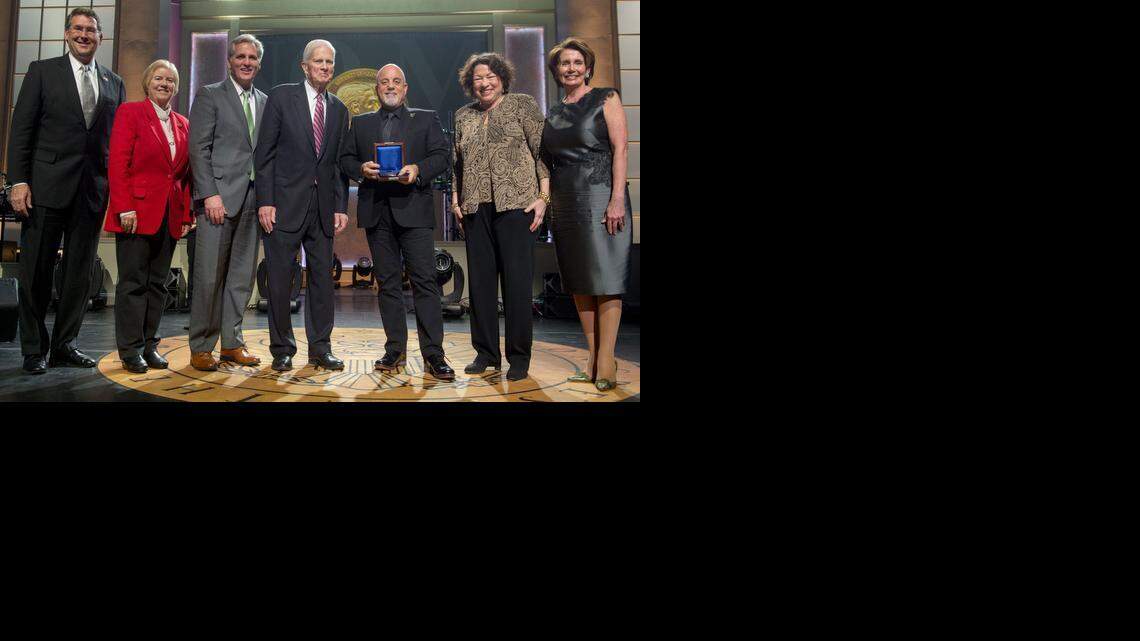 Rep. Gregg Harper, R-Miss., Rep. Candice Miller, R-Mich., House Majority Leader Kevin McCarthy, R-Calif., Librarian of Congress Dr. James H. Billington, Billy Joel, Supreme Court Justice Sonia Sotomayor and House Democratic Leader Nancy Pelosi, D-Calif. (left to right) pose for a photograph after a ceremony awarding the 2014 Gershwin Prize to Billy Joel at the DAR Constitution Hall in Washington, D.C. on Nov. 19, 2014.
