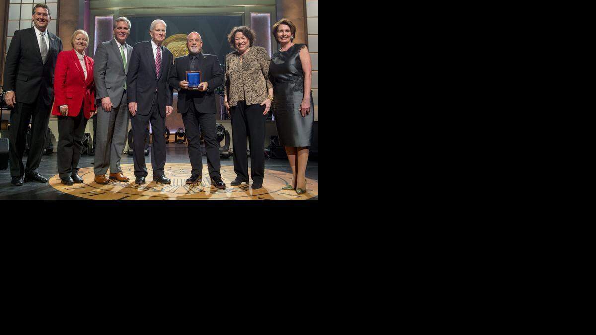 Rep. Gregg Harper, R-Miss., Rep. Candice Miller, R-Mich., House Majority Leader Kevin McCarthy, R-Calif., Librarian of Congress Dr. James H. Billington, Billy Joel, Supreme Court Justice Sonia Sotomayor and House Democratic Leader Nancy Pelosi, D-Calif. (left to right) pose for a photograph after a ceremony awarding the 2014 Gershwin Prize to Billy Joel at the DAR Constitution Hall in Washington, D.C. on Nov. 19, 2014.
