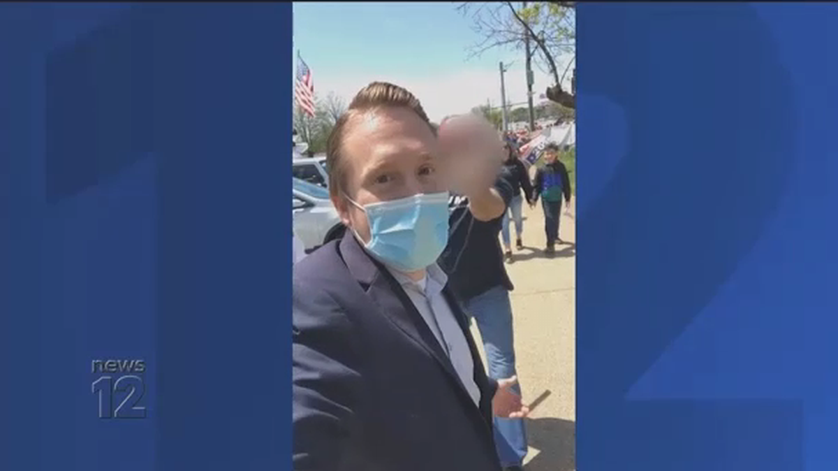 Kevin Vesey of News 12 in Long Island shared video of protesters berating him Thursday. Donald Trump later retweeted the video.