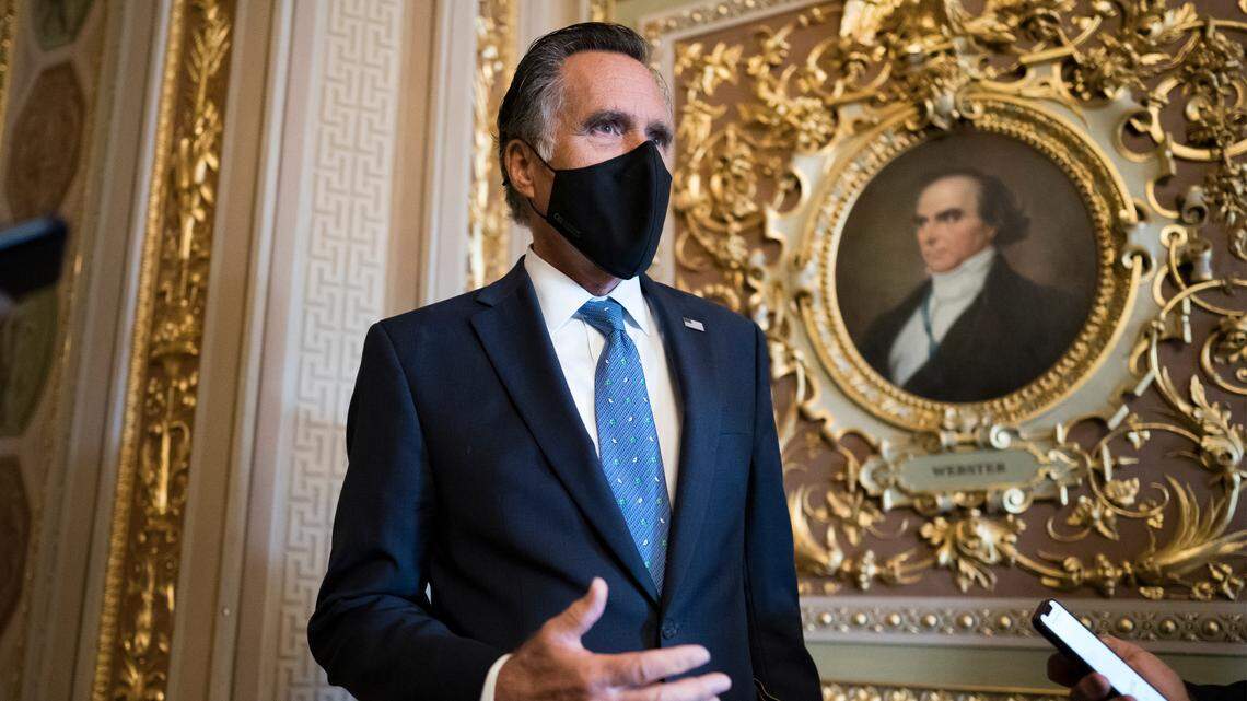 Sen. Mitt Romney, R-Utah, pauses to answer questions from reporters as senators arrive to vote on President Joe Biden’s nominee for United Nation’s ambassador, Linda Thomas-Greenfield, at the Capitol in Washington, Tuesday, Feb. 23, 2021. Romney said he believes former President Donald Trump would win the Republican nomination if he runs for president again in 2024. (AP Photo/J. Scott Applewhite)