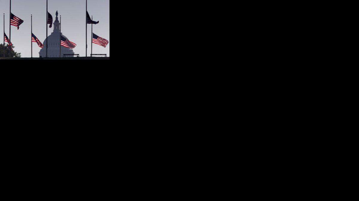 Flags at half-mast in front of the Capitol dome after 9/11