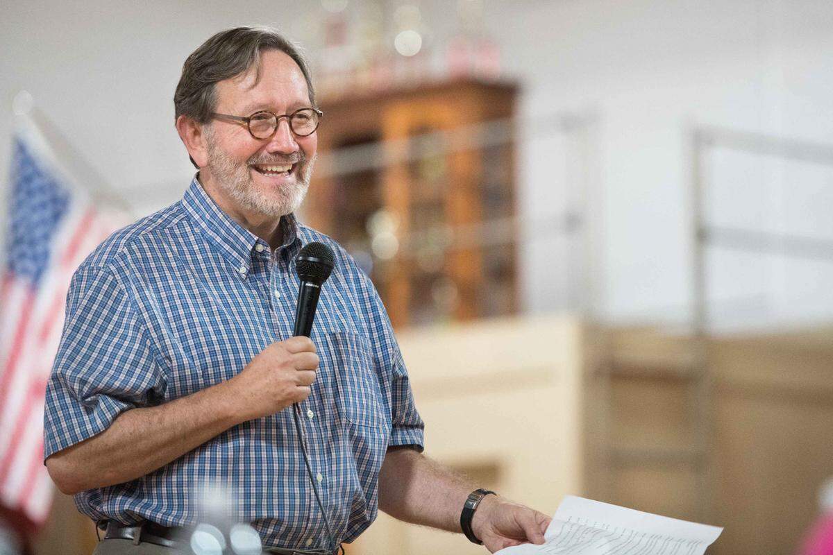 Democratic nominee for South Carolina’s Fifth Congressional District Archie Parnell talks with voters during a fish fry at the old Bishopville High School Aug. 9, 2018, in Bishopville, S.C. The event kicked off Parnell’s eleven county “Truth Tour,” drumming up support in hopes of defeating incumbent Rep. Ralph Norman, R-S.C.