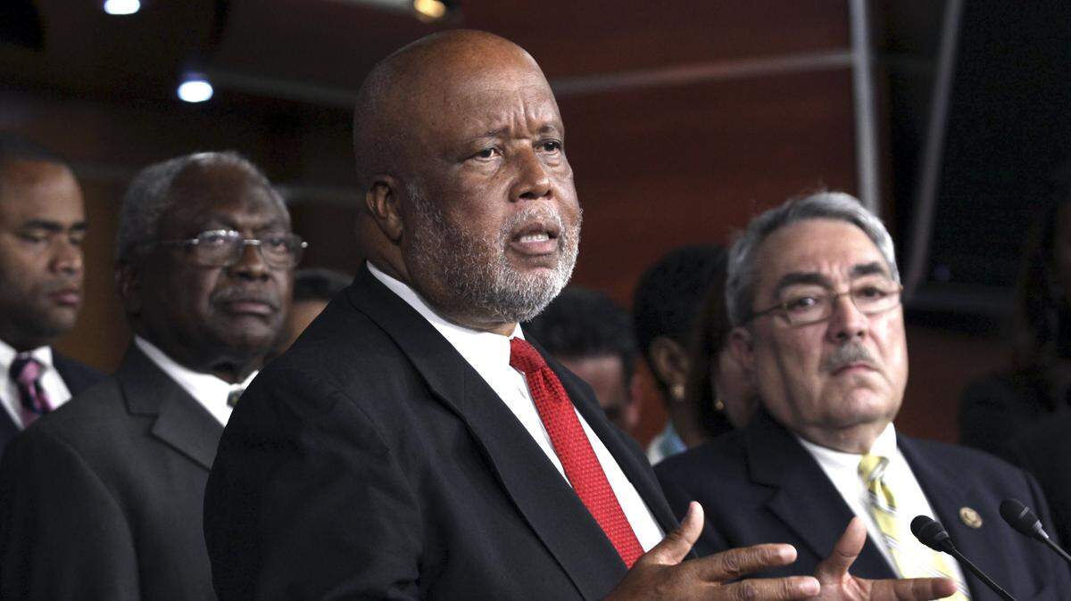 Rep. Bennie Thompson, D-Miss., speaks to reporters as Rep. Jim Clyburn, D-S.C., left, and Rep. G.K. Butterfield, D-N.C., listen, regarding a resolution to remove the confederate flag at Park Service-run cemeteries on Thursday, July 9, 2015 on Capitol Hill in Washington.