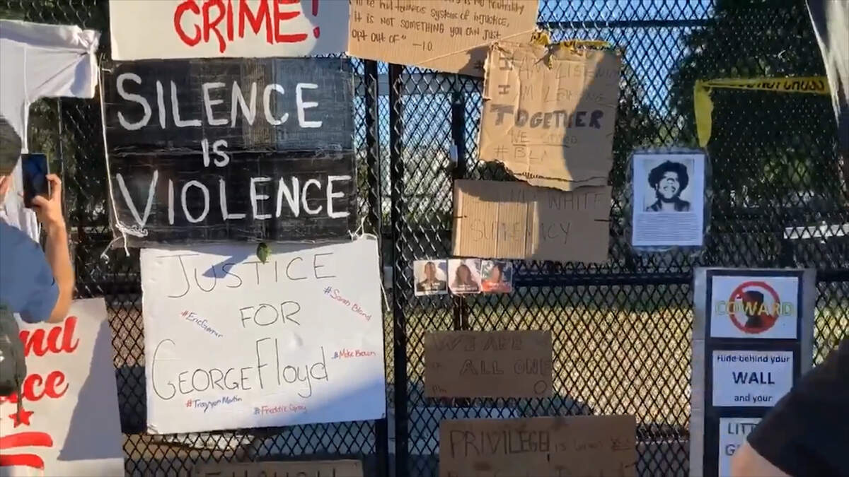 Anti-racism artwork on fence outside the White House in Washington, DC