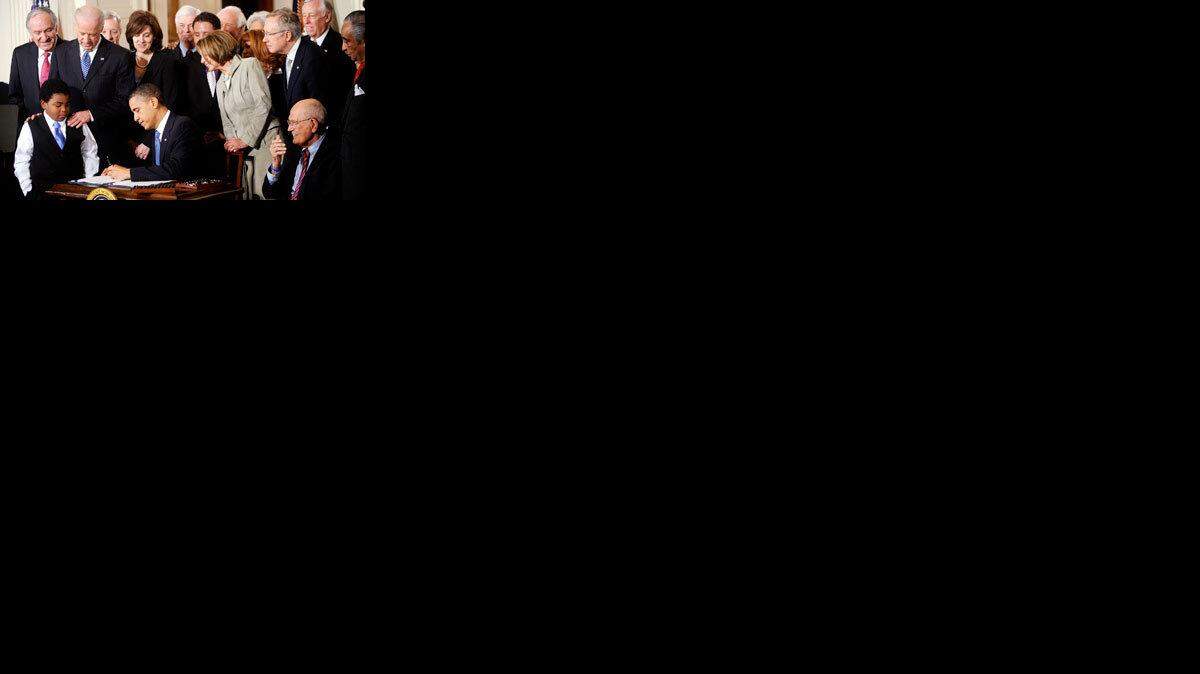 President Obama signs health care legislation