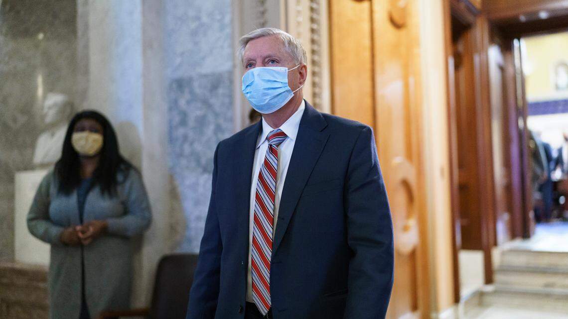 Sen. Lindsey Graham, R-S.C., leaves the chamber after taking an oath and voting on how to proceed on the impeachment against Trump, at the Capitol in Washington, Tuesday, Jan. 26, 2021. He said Tuesday the trial will be dragged out if Democrats call any witnesses. (AP Photo/J. Scott Applewhite)