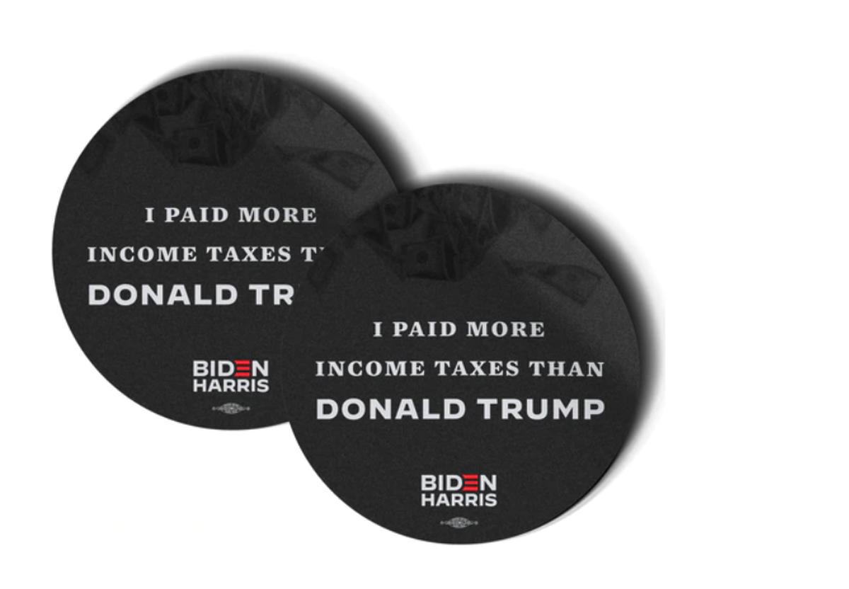 Joe Biden’s campaign released new fundraising stickers Sunday a few hours after a New York Times report on Donald Trump’s income taxes.