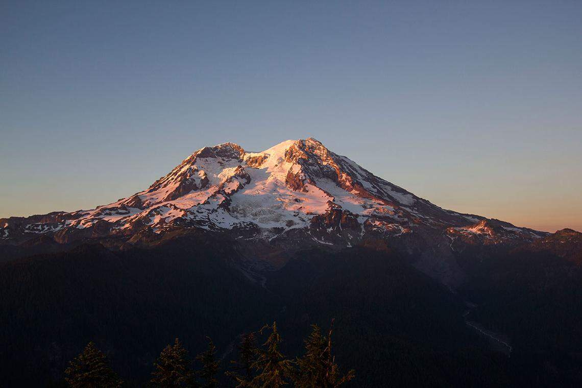 Mount Rainier is the tallest mountain in the Cascade Range. Thousands of people climb the mountain every year, park officials say.