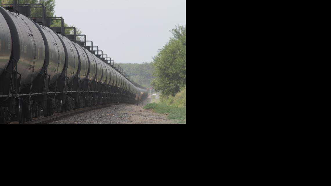  A BNSF train of empty oil cars heads west at Sugar Grove, Ill., on Aug. 20, 2014. A loaded BNSF train on the same line derailed Thursday near Galena, Ill., about 160 miles west of Chicago
