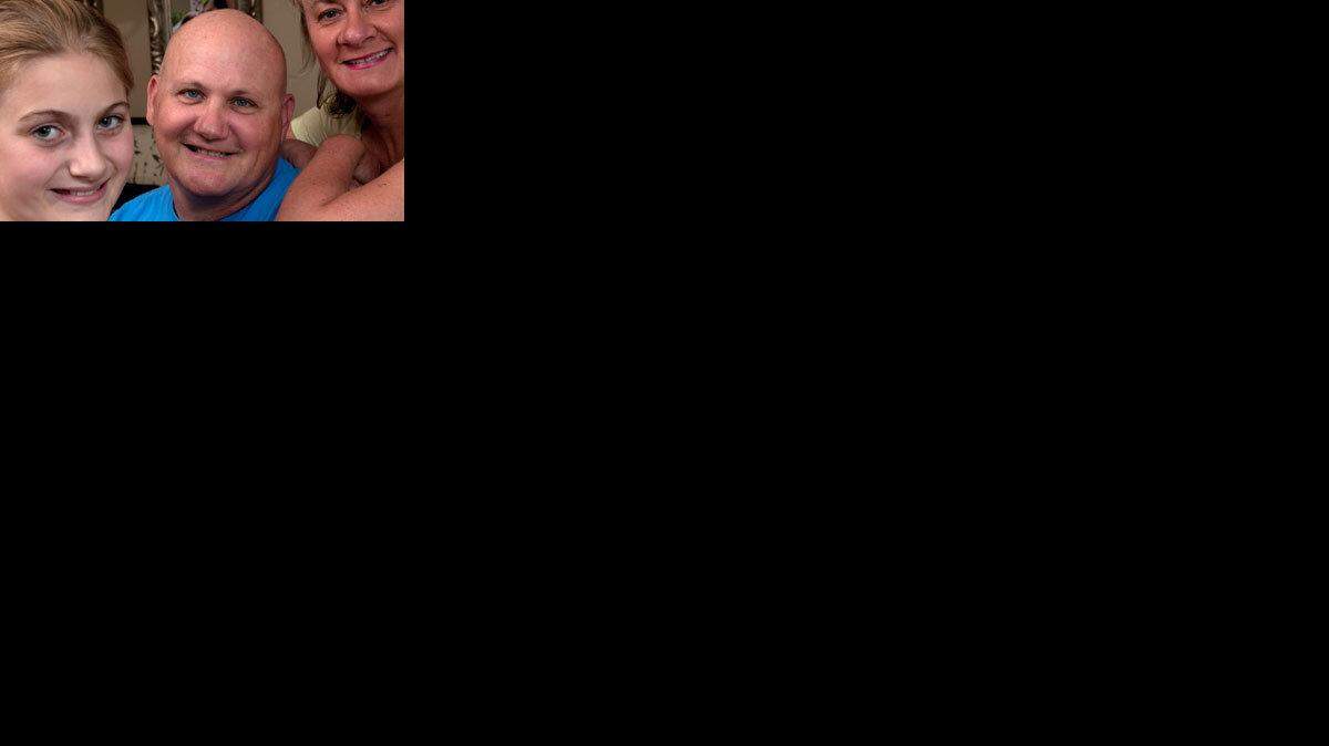 Peter Devereaux, with his 12 1/2 year-old-daughter Jackie, and wife, Fiona, believes his cancer that is wasting his innards was caused by drinking contaminated water at Camp Lejeune, North Carolina.