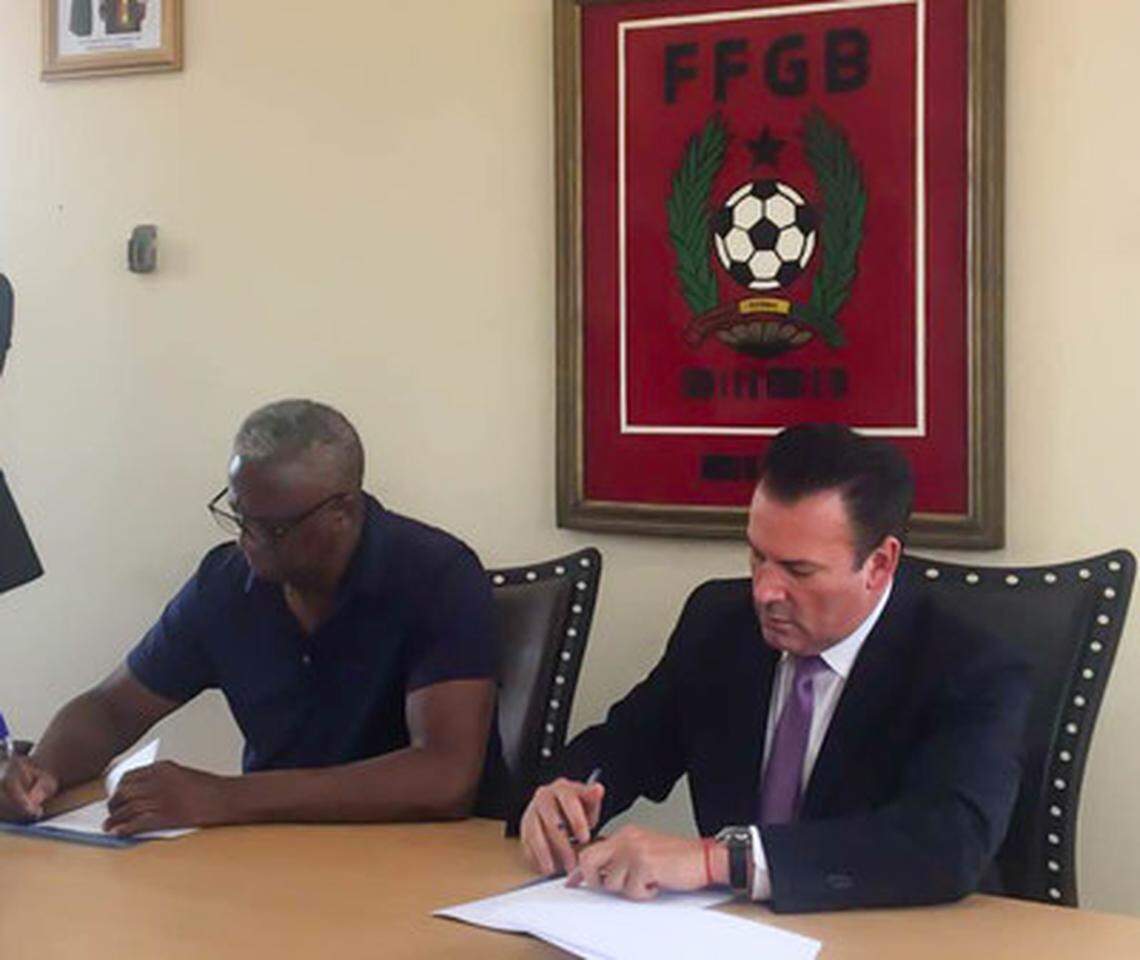 Manuel Irenio Lopes Nascimento, president of the Guinea-Bissau Football Federation, and Oscar A. Faria, president and CEO of African Football Corp.