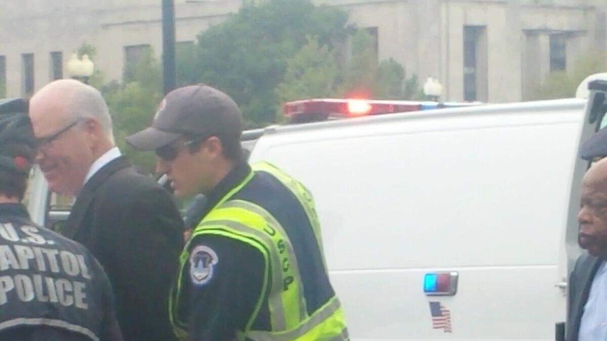 Rep. John Lewis was arrested at about 4:15 p.m.