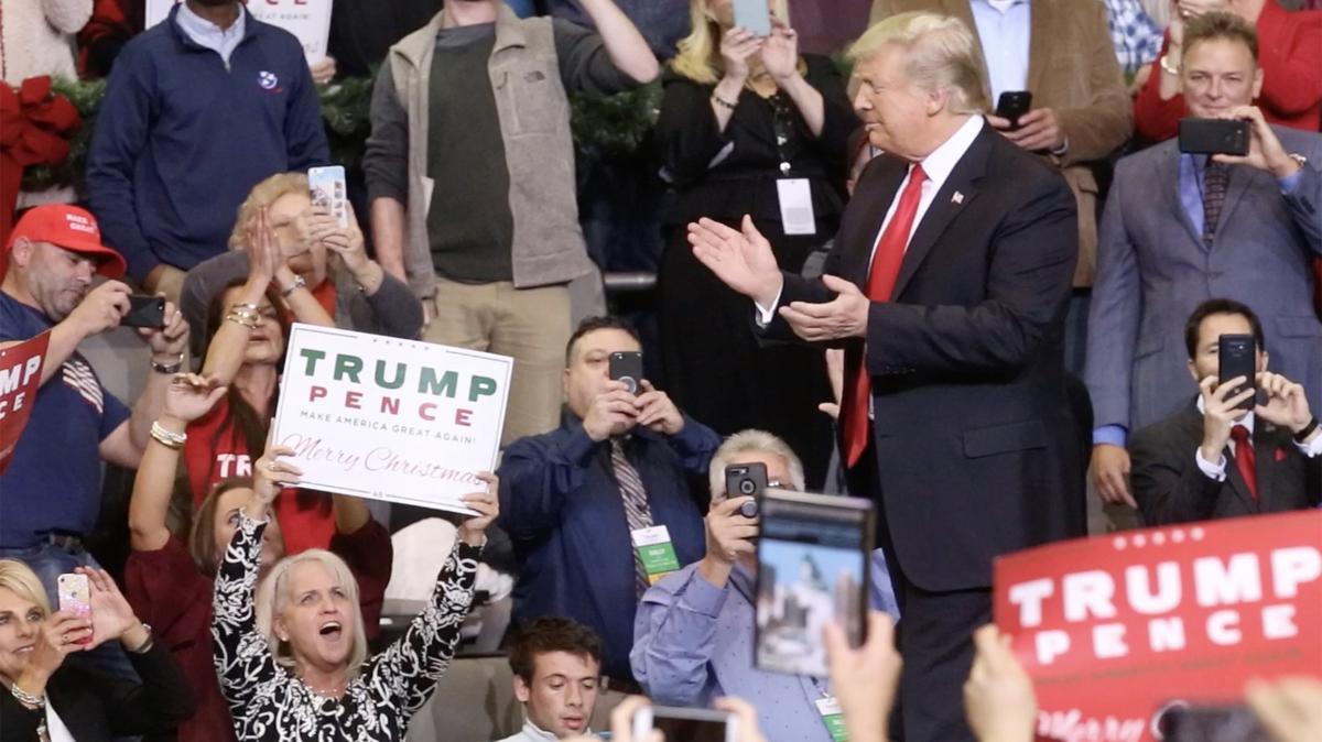 Fans cheer as President Donald Trump makes an appearance on Monday, Nov. 26, 2018 at the Mississippi Coast Coliseum in Biloxi, Miss. to campaign for Sen. Cindy Hyde-Smith, R-Miss. Hyde-Smith faces Democrat Mike Espy in a runoff on Tuesday, Nov. 27, to complete retired Sen. Thad Cochran’s term.