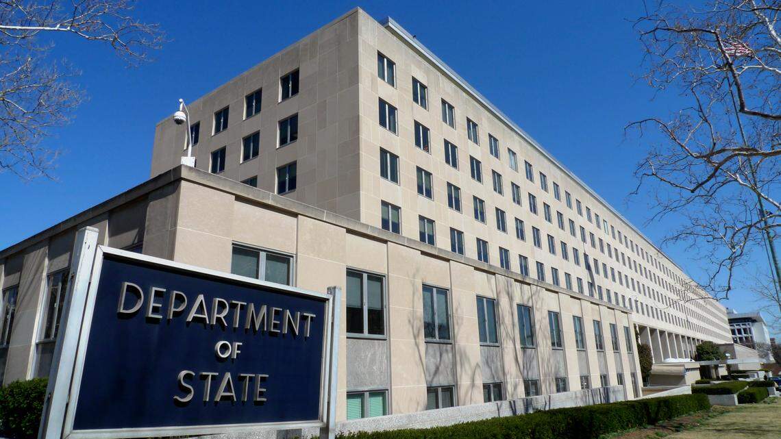 The Harry S. Truman Building, headquarters for the State Department, is seen in Washington. The State Department on Tuesday changed a policy that denied citizenship to some children born abroad through IVF, surrogacy or other reproduction assistance technology.