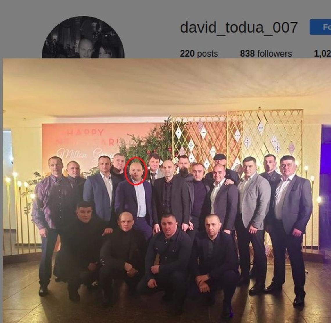 David Todua (circled) with other attendees at Milton Group’s Great Gatsby-themed party.