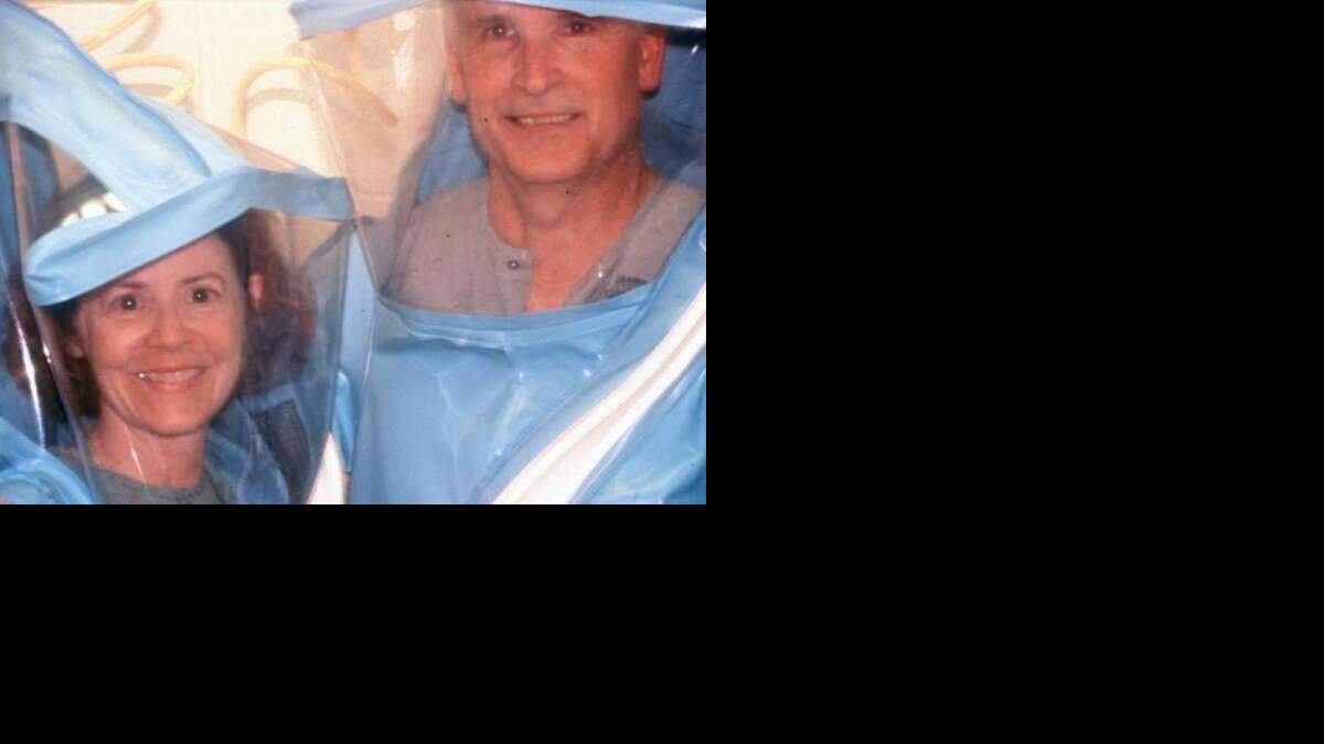 Nancy and Jerry Jaax wearing laboratory “space suits” used at USAMRIID for BSL-4 work around the time of the Reston, Va., outbreak. The Jaaxes are former Army veterinarians who were part of the Ebola response team there in 1989.
