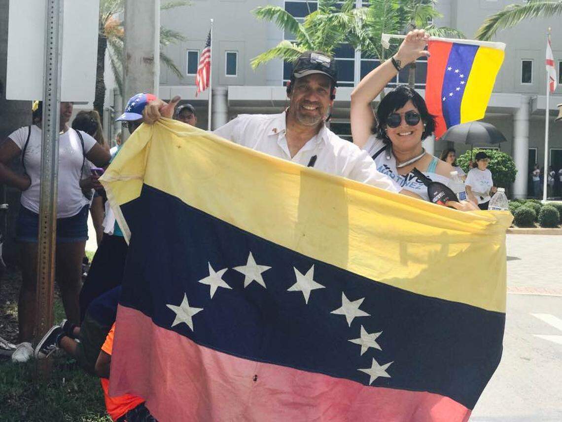 This screenshot from the Facebook page of Antonio Intriago shows the Miami security provider and his girlfriend, Mariana Martínez Blanco­, waving the Venezuelan flag.