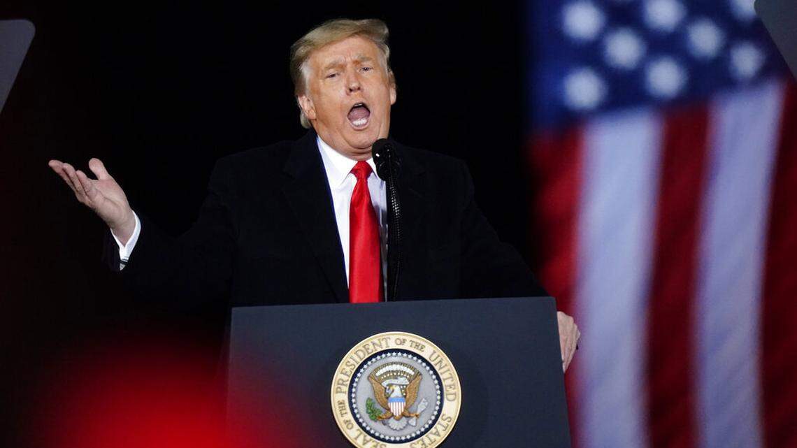 President Donald Trump speaks at a campaign rally in support of Senate candidates Sen. Kelly Loeffler, R-Ga., and David Perdue in Dalton, Ga., Monday, Jan. 4, 2021. (AP Photo/Brynn Anderson)
