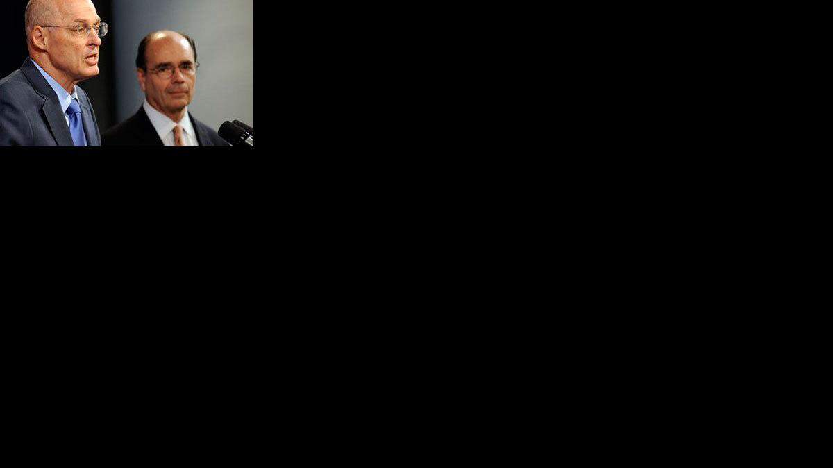 Treasury Secretary Henry Paulson, Jr., left, speaks during a news conference with Federal Housing Finance Agency Director James Lockhart, right, in Washington, Sunday, Sept. 7, 2008 on the bailout of mortgage giants Fannie Mae and Freddie Mac. (AP Photo/Susan Walsh)