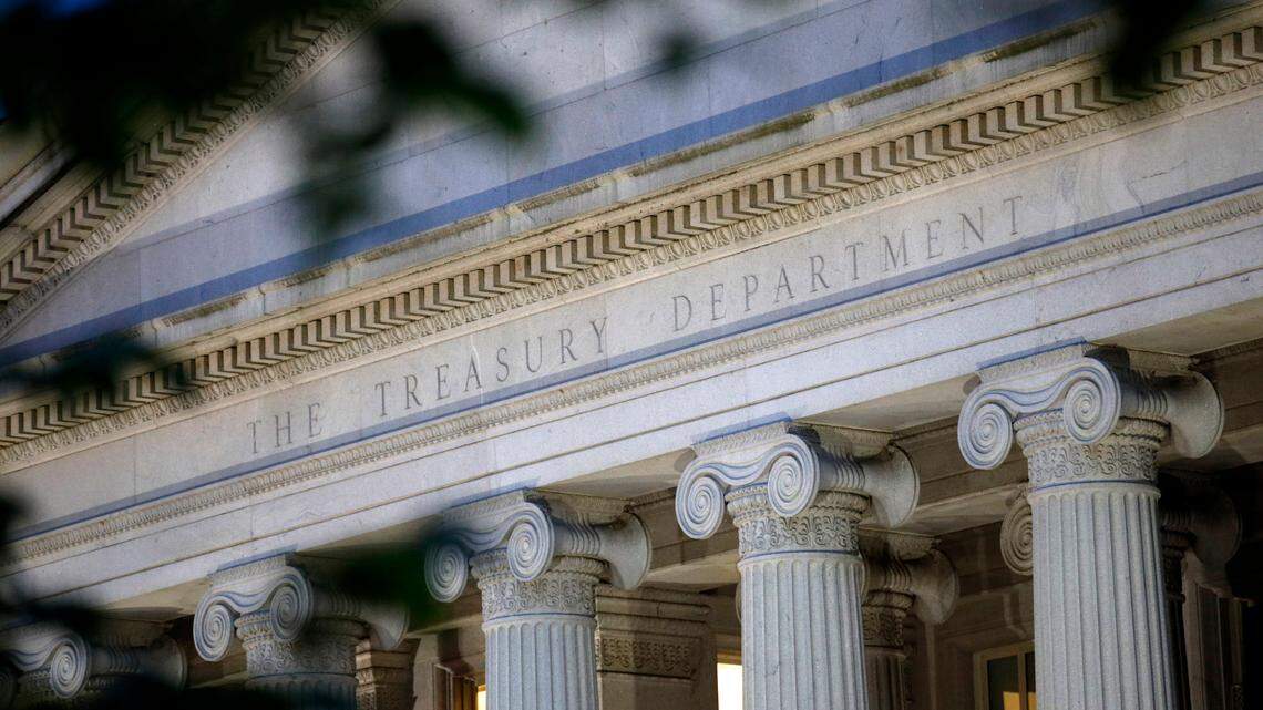 FILIE - This June 6, 2019, file photo shows the U.S. Treasury Department building at dusk in Washington. White House Press Secretary Jen Psaki said Monday the department will renew efforts to put Harriet Tubman on the $20 bill. (AP Photo/Patrick Semansky, File)