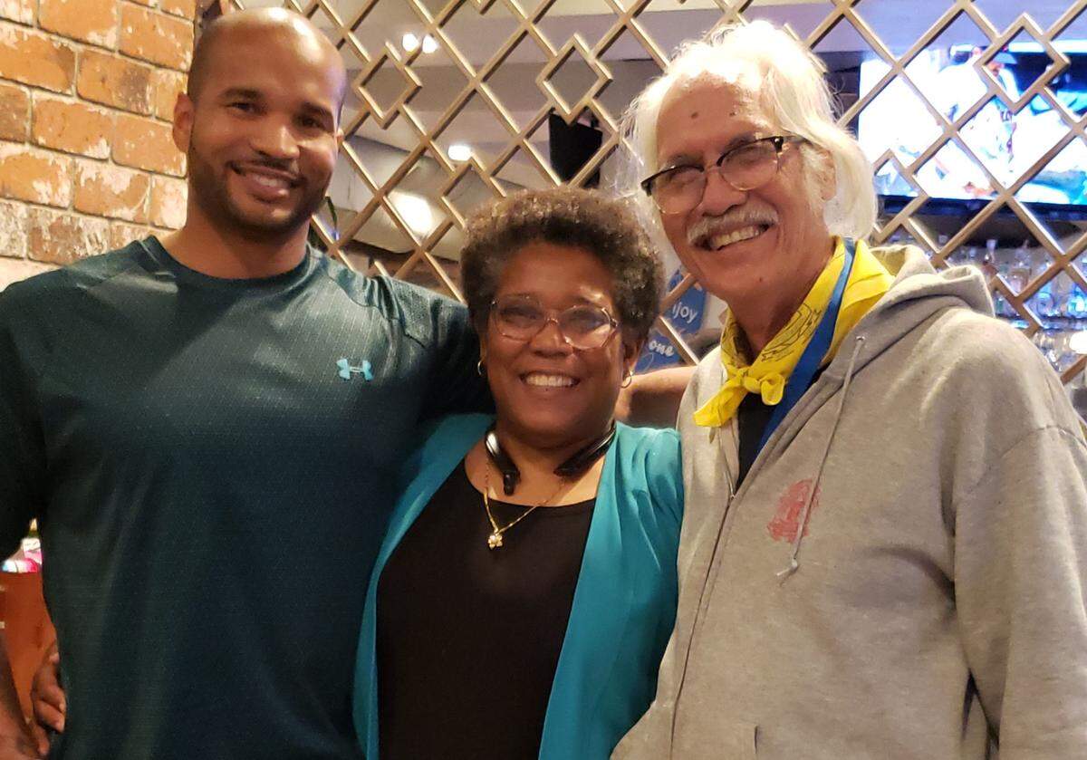 Lt. Col. (ret.) Marcella Hayes Ng (center) went on to serve a full military career and raise a family. In 1999, while she was commanding the 49th Transportation Battalion at Fort Hood, Texas, a young Black female pilot came to her for help, because she was facing some of the same challenges Ng had 20 years before. Ng, whose own flying career was cut short, was able to help the younger pilot.