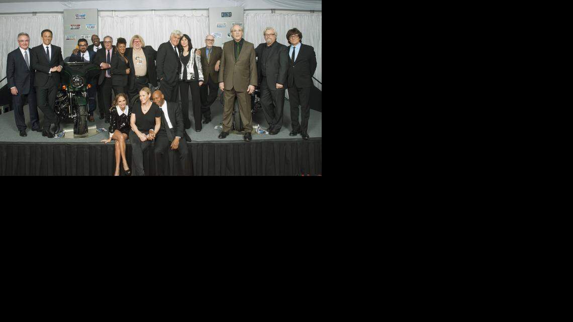 Cappy McGarr (far left) joins Jay Leno (center) after he received the Mark Twain Prize for American Humor at the John F. Kennedy Center for the Performing Arts in Washington, D.C. on Oct. 19, 2014.
