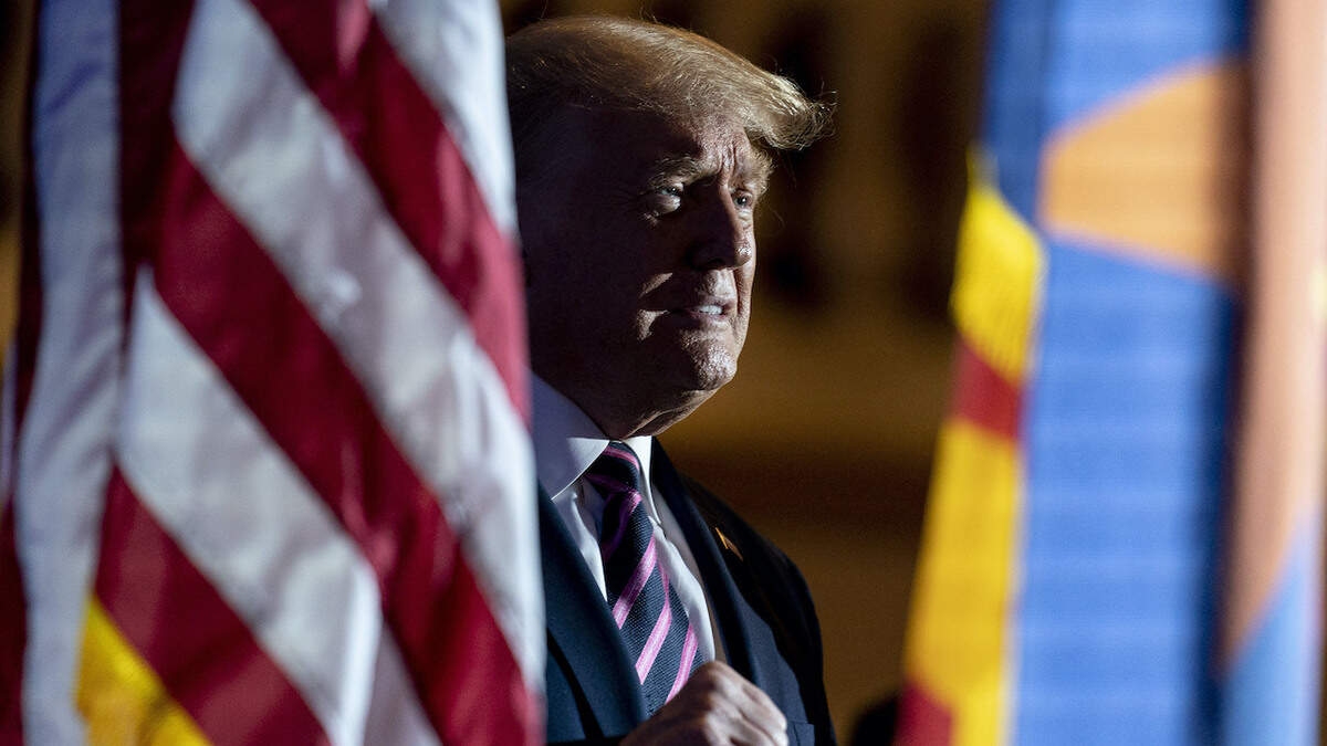 President Donald Trump arrives for a Latinos for Trump Coalition roundtable at Arizona Grand Resort & Spa, Monday, Sept. 14, 2020, in Phoenix. (AP Photo/Andrew Harnik)