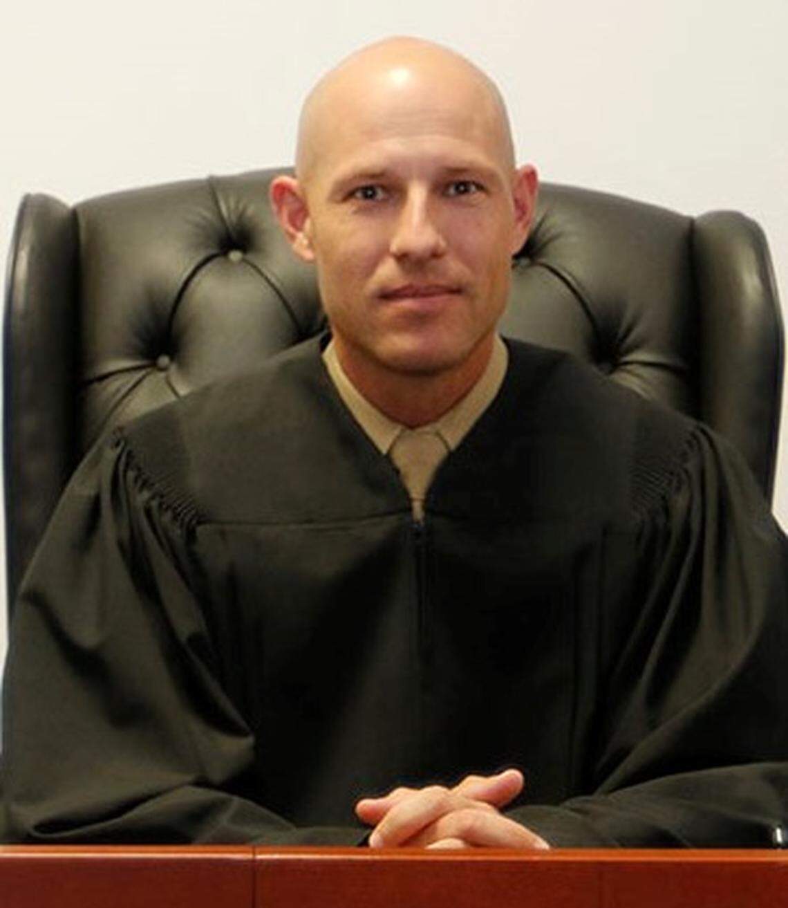 U.S. Marine Corps judge Lt. Col. Michael D. Libretto, sitting in his robe on the bench at the Expeditionary Legal Complex, Guantánamo Bay, Cuba, in this Sept. 24, 2018 Pentagon handout photo.