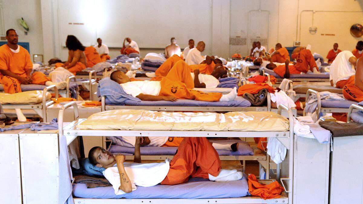 Inmates live in crowded conditions at California State Prison, Los Angeles.