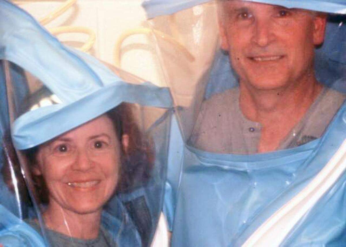 Nancy and Jerry Jaax wearing laboratory “space suits” used at the U.S. Army Medical Research Institute of Infectious Diseases, around the time of the Reston, Virginia, scare.