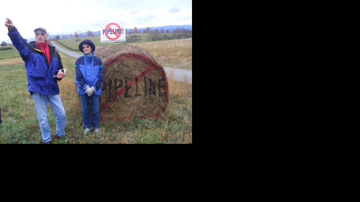 Fred and Bonnie Powell stand on their Augusta County, Va. farmland that lies on the proposed route of the 550-mile Atlantic Coast Pipeline from West Virginia to eastern North Carolina on Nov. 1, 2014. The Powells are not allowing Dominion Resources to survey for the right-of-way. “We’re not against pipelines but the location for this is terrible,” said Fred Powell.
