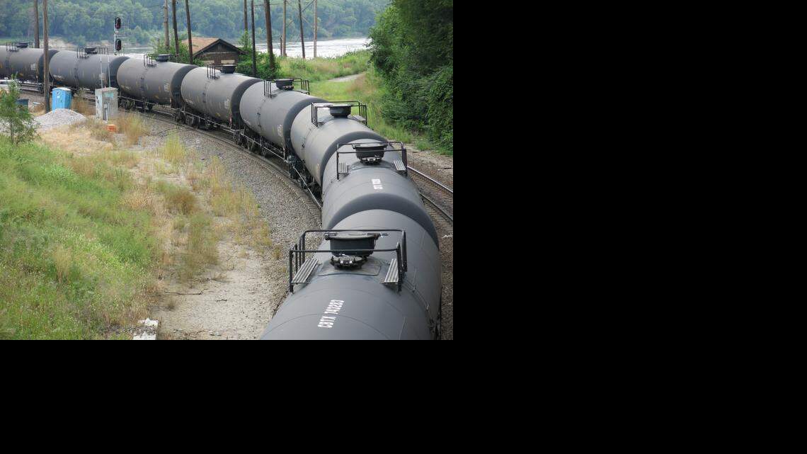 A BNSF Railway crude oil train snakes through the West Bottoms of Kansas City, Mo., on Aug. 29, 2014. Documents released by the Missouri State Emergency Management Agency show that as many as 10 trains carrying more than 1 million gallons of crude oil pass through Kansas City every week. However, the documents do not reveal whether other types of crude oil from Colorado, Wyoming or western Canada, move through the region. (Curtis Tate/McClatchy)
