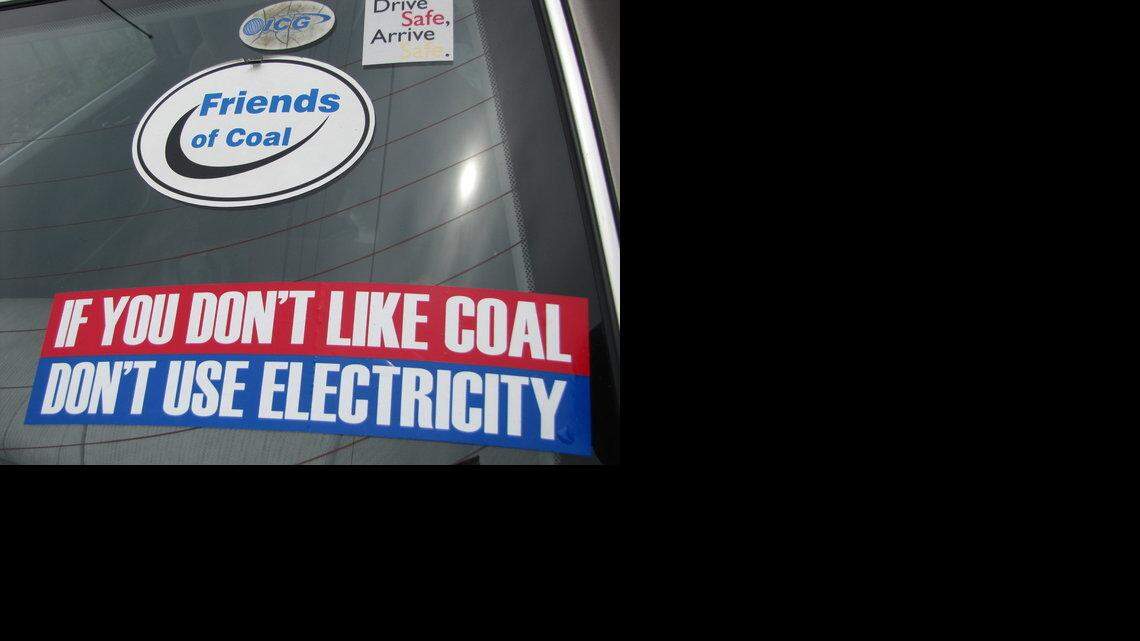 The sticker on the back window of a miner's car at Arch Coal's Raven coal-preparation plant in Knott County shows how miners feel about the product they produce to power the country.