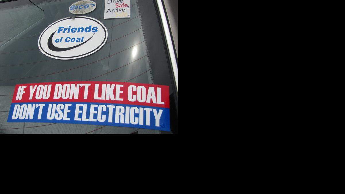The sticker on the back window of a miner's car at Arch Coal's Raven coal-preparation plant in Knott County shows how miners feel about the product they produce to power the country.