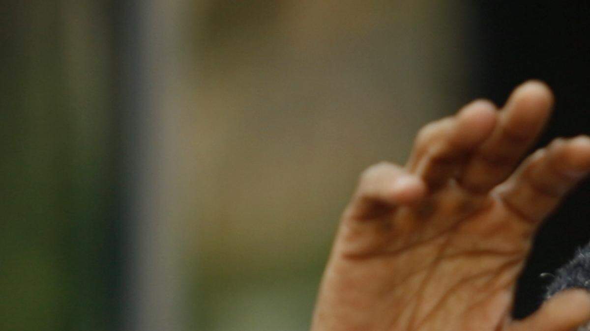 Sen. Barack Obama leaves Democratic National Committee headquarters on Thursday.