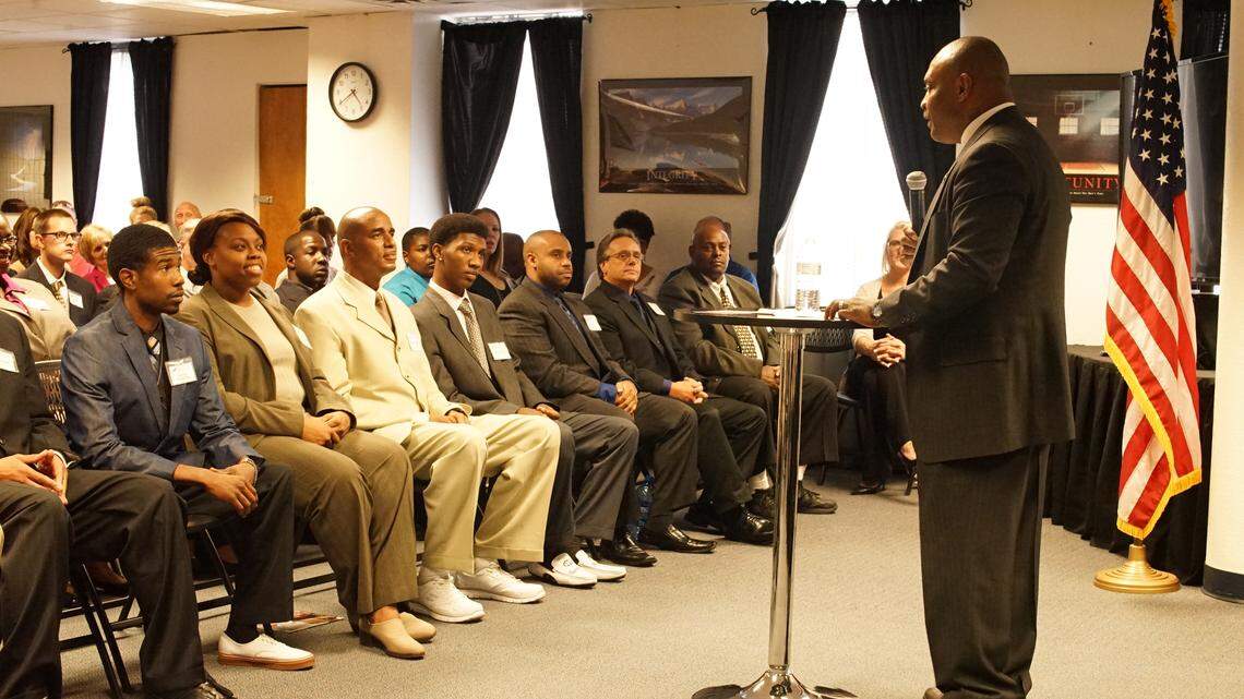 .Jon Ponder, founder of HOPE for Prisoners in Las Vegas, speaks to a recent class of graduates from his reentry program for former prisoners. A convicted felon himself, Ponder now graduates about 30 people each month from the program, which provided the photo.