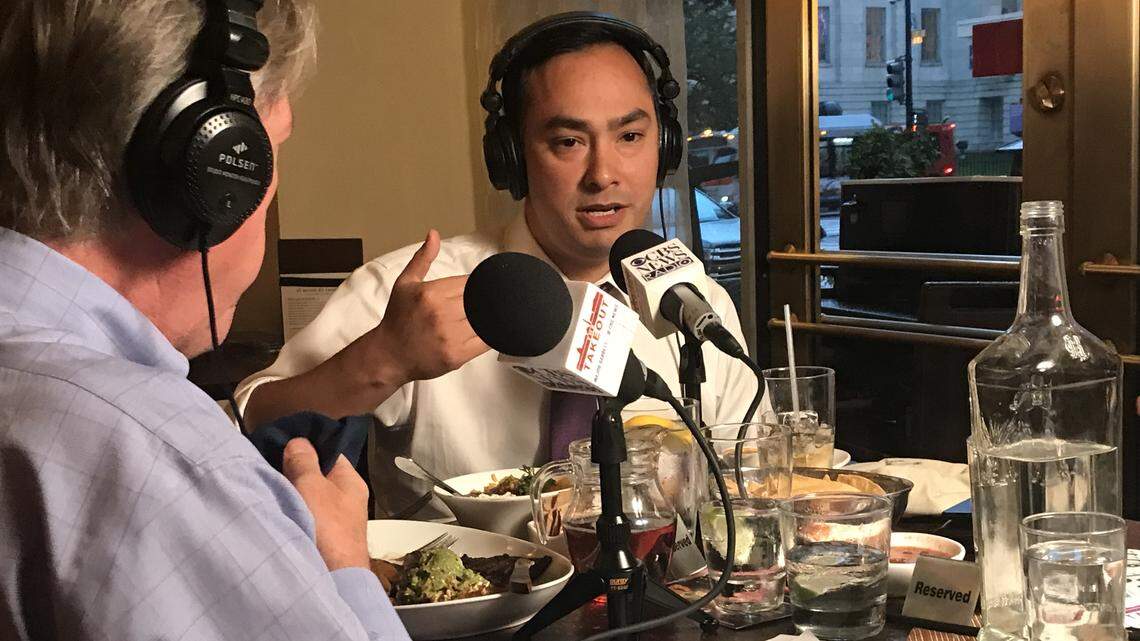 Texas Rep. Joaquin Castro, right, records The Takeout podcast with CBS Chief White House Correspondent Major Garrett, left, at Rosa Mexicana restaurant, July 25, 2018.