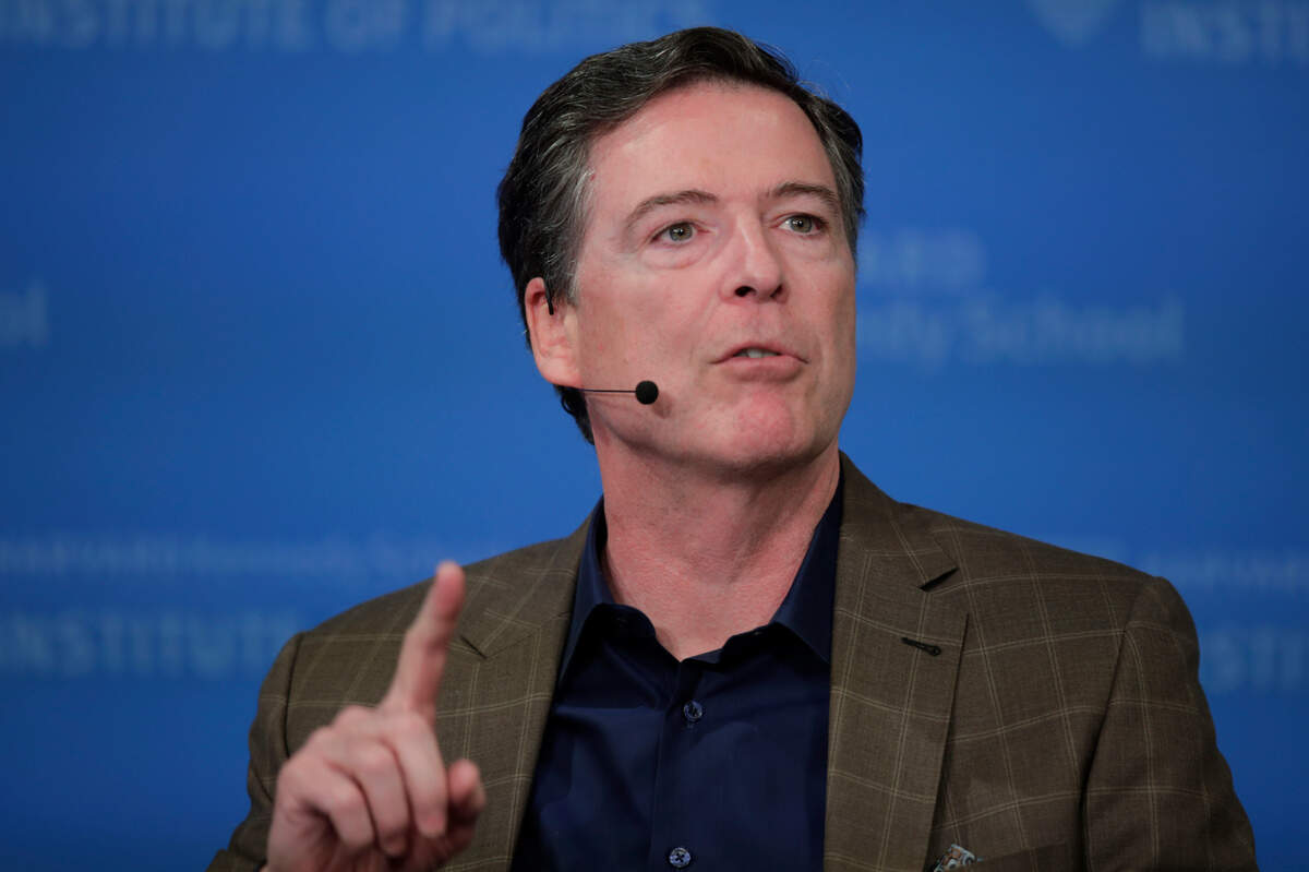 FILE - In this Feb. 24, 2020, file photo, former FBI director James Comey speaks at Harvard University’s Institute of Politics’ JFK Jr. Forum in Cambridge, Mass. (AP Photo/Charles Krupa, File)