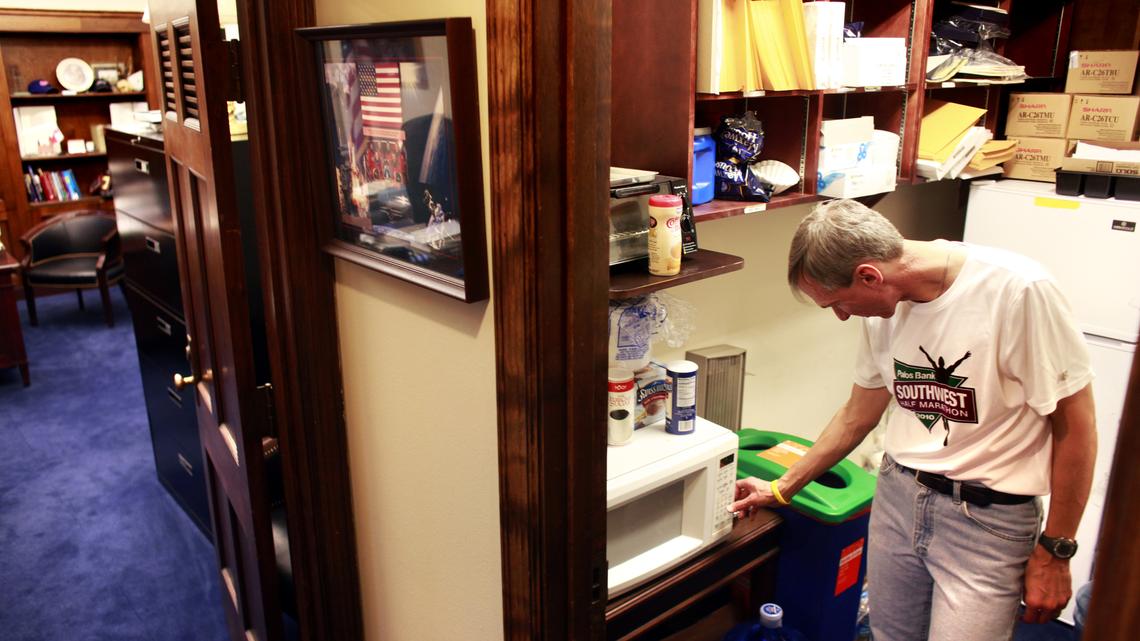 Rep. Dan Lipinski, D-Illinois, used to live in his Washington, D.C., office when he away from his Chicago district. Here he cooks his dinner in a microwave before eating at his desk. Lipinski moved into an apartment in 2014 to have more privacy.