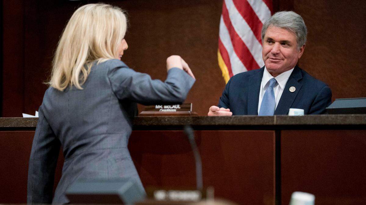 Then-Homeland Security Secretary Kirstjen Nielsen greets then-House Homeland Security Committee Chairman Rep. Michael McCaul, R-Texas, as she arrives for a House Homeland Security Committee subcommittee on Capitol Hill in Washington, April 26, 2018.