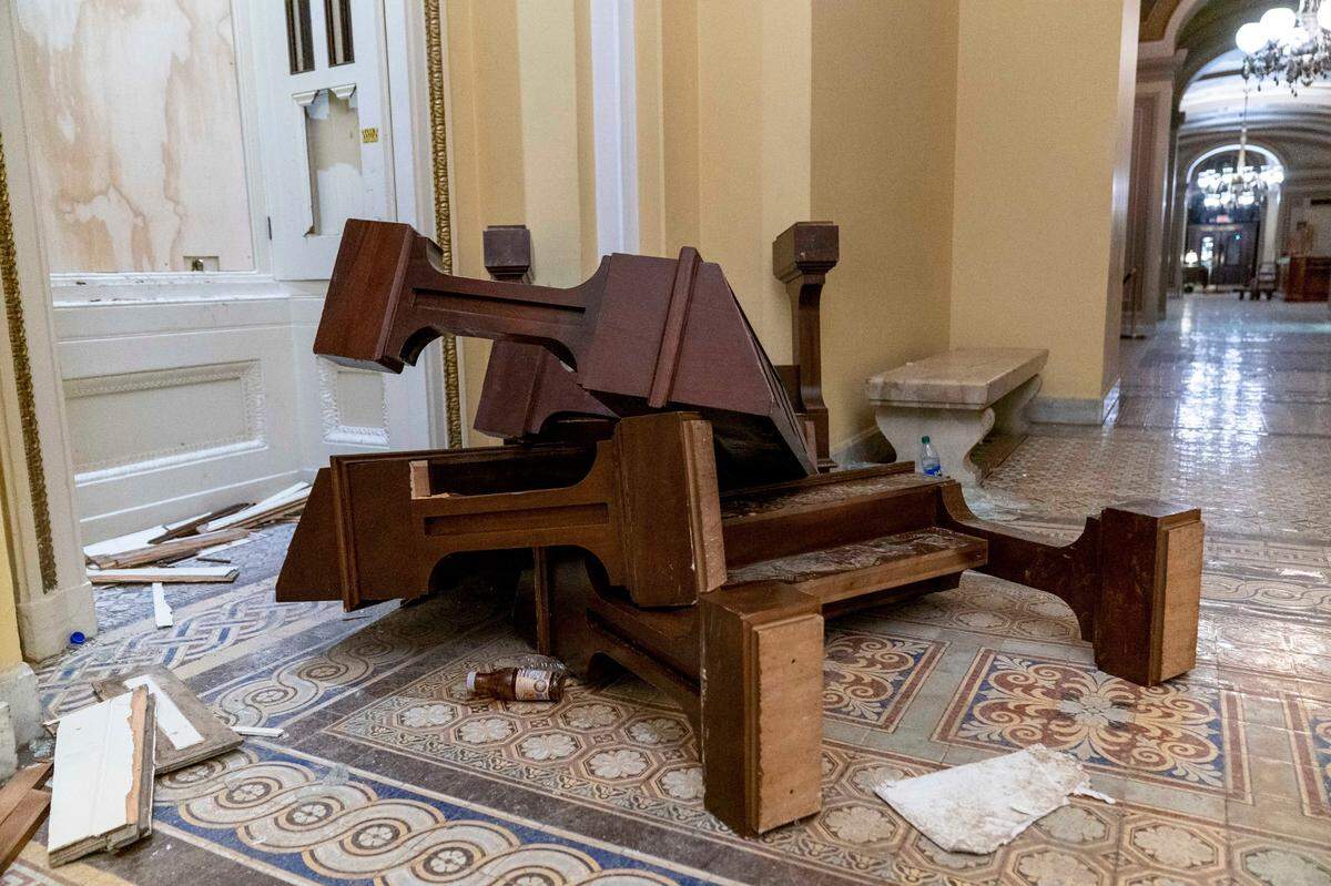 Damage is visible in the early morning hours of Thursday, Jan. 7, 2021, after rioters stormed the Capitol in Washington, on Wednesday. (AP Photo/Andrew Harnik)