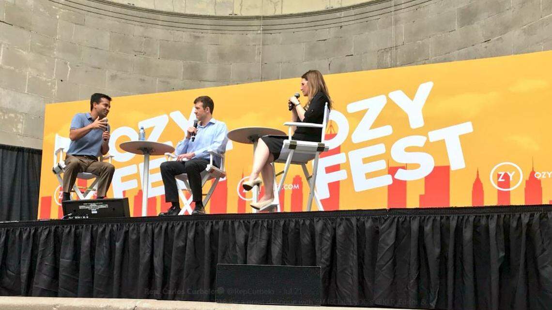 Rep. Carlos Curbelo, R-Florida, left, is interviewed by Ozy’s Daniel Malloy and McClatchy’s Kristin Roberts at Ozy Fest in New York.