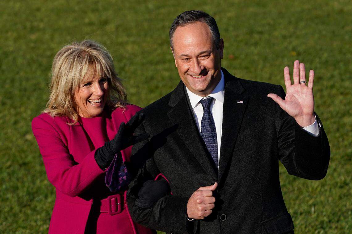 Doug Emhoff, husband of Vice President Kamala Harris, and first lady Jill Biden arrive before President Joe Biden signs the $1.2 trillion bipartisan infrastructure bill into law during a ceremony on the South Lawn of the White House in Washington, on Nov. 15, 2021.