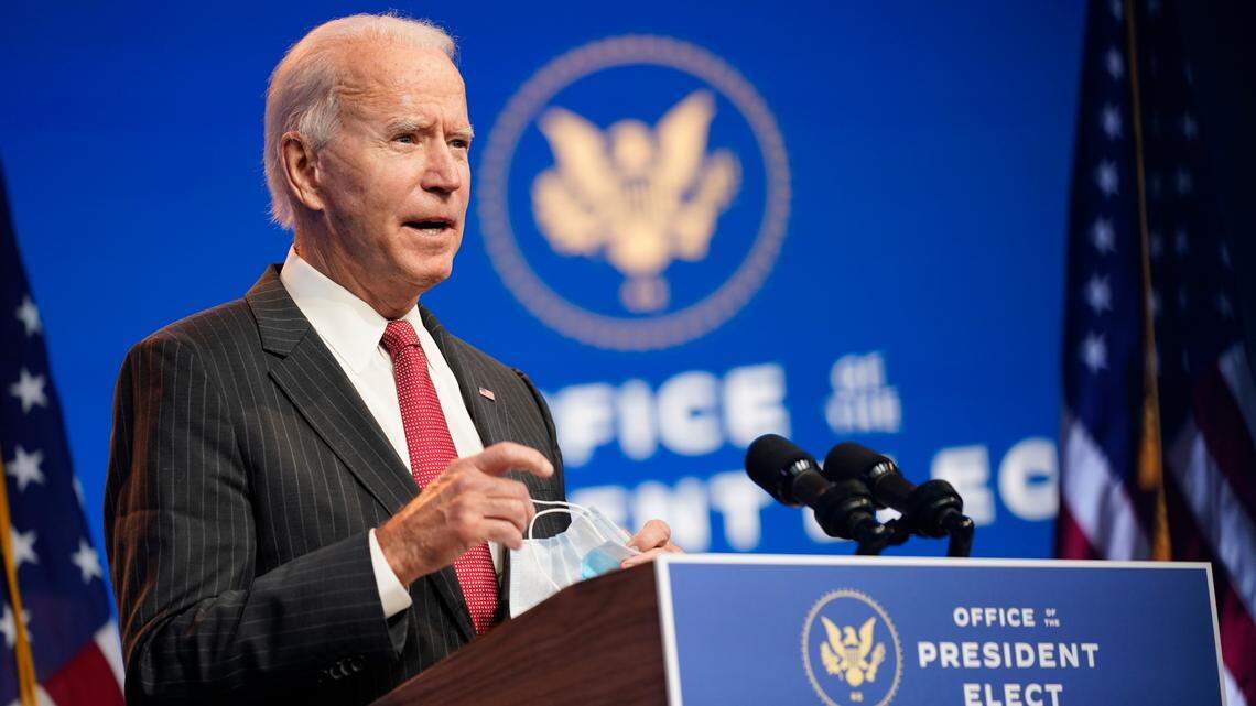 FILE - In this Nov. 19, 2020, file photo President-elect Joe Biden speaks at The Queen theater in Wilmington, Del. He and members of his team have said members of President Donald Trump’s administration aren’t cooperating with the transition as they should be. (AP Photo/Andrew Harnik, File)