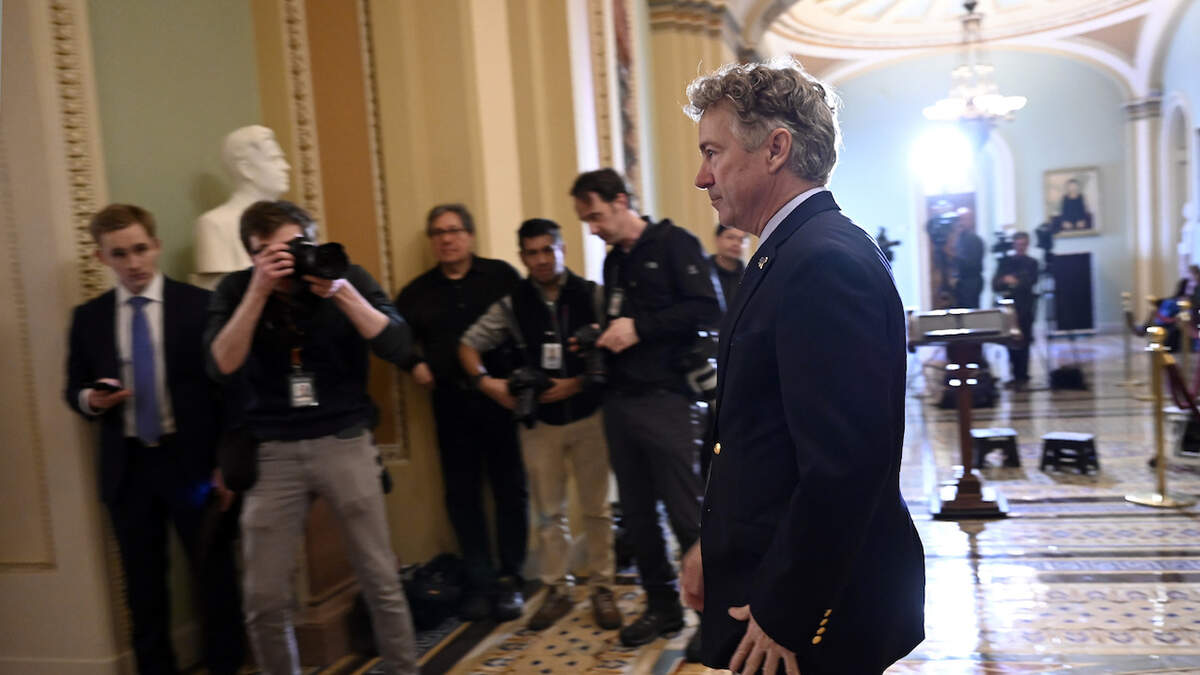 Sen. Rand Paul, R-Ky., walks on Capitol Hill in Washington, Tuesday, Feb. 25, 2020. (AP Photo/Susan Walsh)