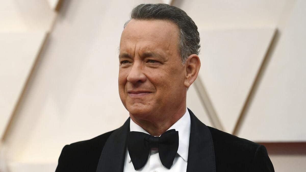 FILE Tom Hanks, shown last year at the Oscars, will host a primetime special Wednesday night.