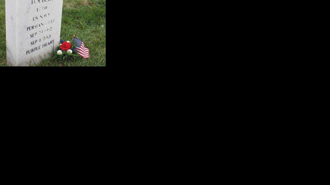 The gravesite of Lt. Cmdr. Otis Vincent Tolbert, a former Fresno, California resident and Navy intelligence officer killed at the Pentagon on 9/11, is located at Arlington Cemetery in Arlington, Virginia. (Mike Doyle/MCT)