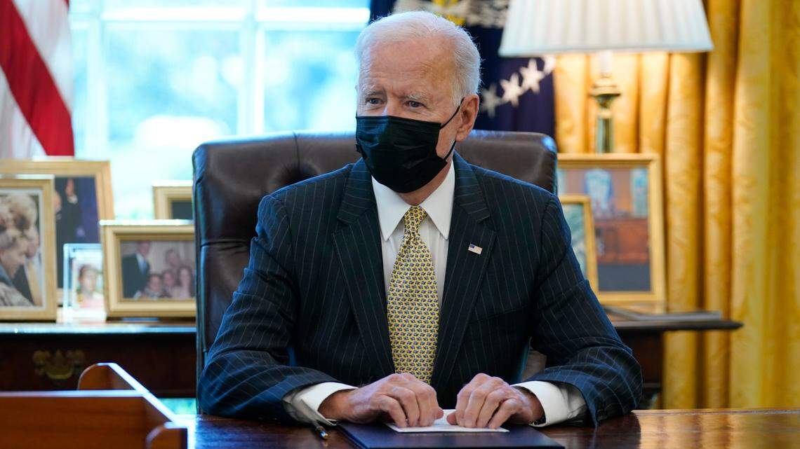 In this March 30, 2021, President Joe Biden speaks after signing the PPP Extension Act of 2021, in the Oval Office of the White House in Washington. Biden is set to discuss part of his infrastructure plan Wednesday. (AP Photo/Evan Vucci)