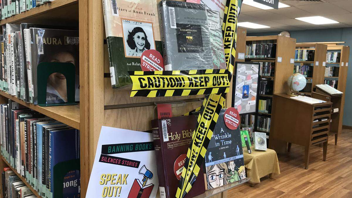 A display at the Guantánamo public library Thursday, Sept. 27, 2018, not far from the thrift shop, gas station and McDonald’s, sought to educate patrons about the American Library Association’s annual Banned Books Week. This year’s theme: “Banning Books Silences Stories.”  This photo was screened by a Navy base official, who approved its release to the public.