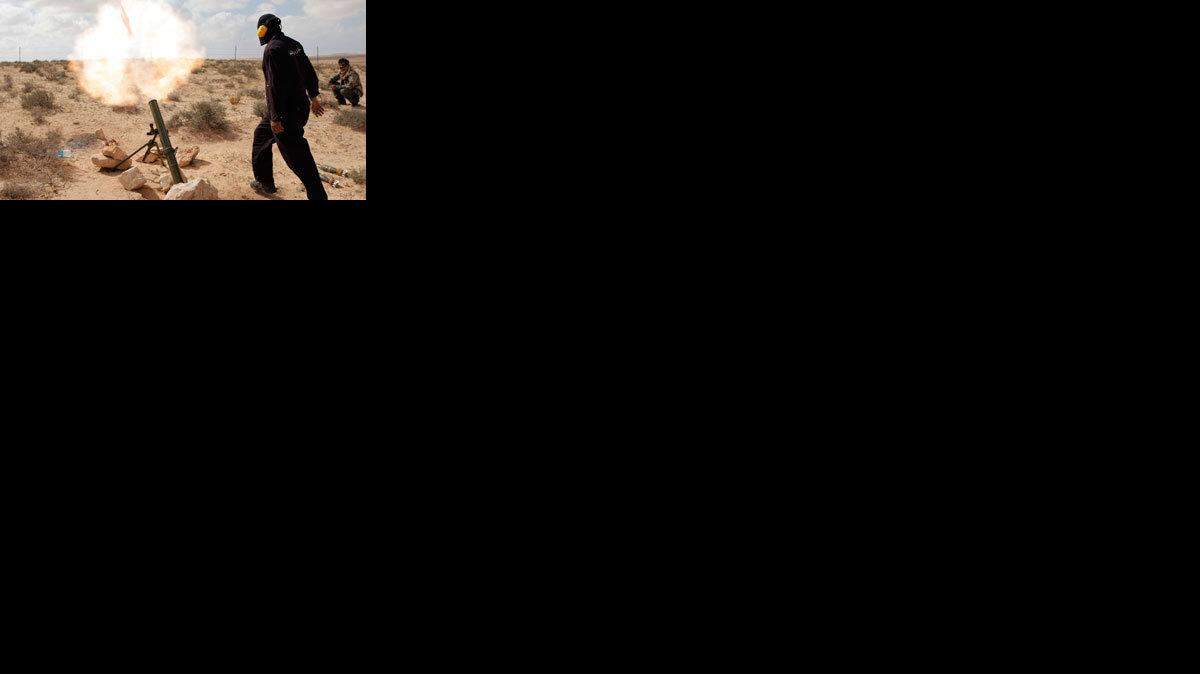 Rebels bomb pro-Gadhafi positions in Libya